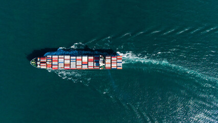 Top view Container ship full capacity approaching port International Container ship loading, unloading at sea port, Freight Transportation, Shipping,Logistics, import export, Transportation. Global