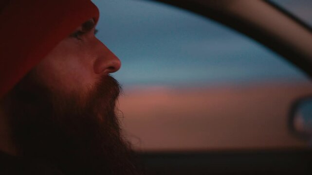 Man Driving Through Iceland on a Sunny Morning