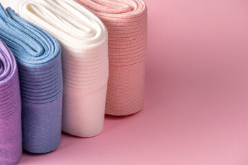 Colorful cotton socks in various shades displayed elegantly for retail shopping