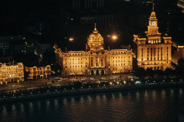 Illuminated Historic Buildings Along the Waterfront at Night