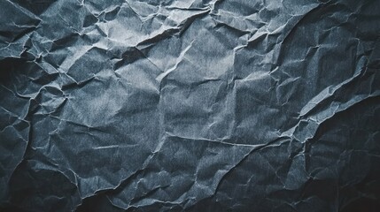 Fototapeta premium Textured, crumpled dark gray paper surface.