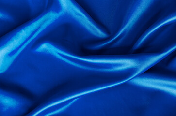 Polished blue silk cloth with silky sheen and beautiful natural draping. Suitable for design and wallpaper background