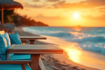 A serene beach scene at sunset with lounge chairs and gentle waves.
