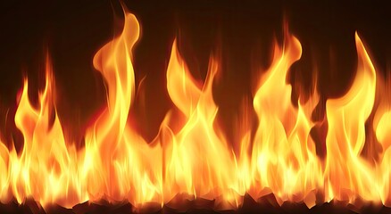 Fototapeta premium Fiery orange and yellow flames against a dark background. Intense, realistic fire texture