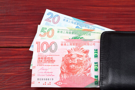 Hong Kong dollars in the black wallet