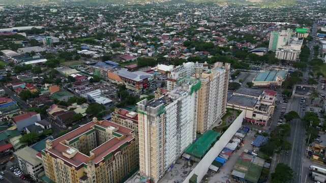 Aerial View Of Sienna Towers - High-rise Condominium Buildings In Marikina City, Philippines. ascending pullback shot