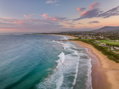 Sunrise looking south along Bulli Beach to Woonona rock pool