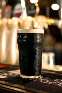 Pint of guinness on a bar