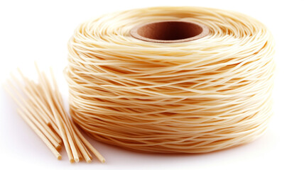 Round bundle of uncooked noodles on white background