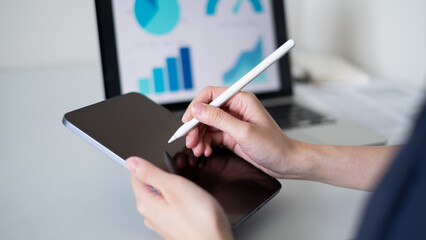Business person working on tablet chart graph data analysis office computer hand digital technology concept