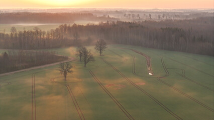 Tractor tracks in a rural landscape from above