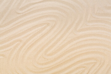 Textured beach sand as background, top view