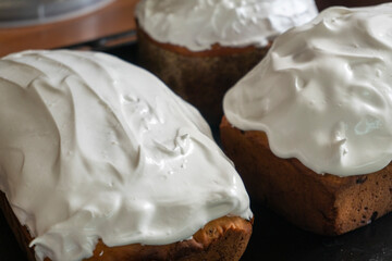 making a cake in a mixer. Cake with white topping. Dessert
