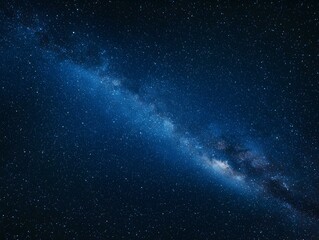 Fototapeta premium Stunning Milky Way galaxy at night. Perfect for backgrounds, websites, and space-themed designs.