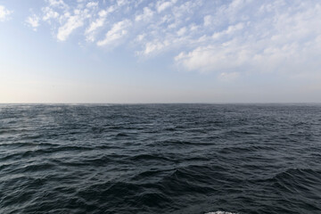 Obraz premium Sea and Beautiful seascape - waves and sky with clouds. Winter sea.