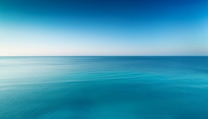 Fototapeta premium a serene gradient of teal and aquamarine shades evoking calmness and tranquility with soft tonal variations near the horizon