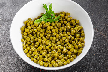 Green peas canned appetizer vegetables dish organic product fresh tasty gourmet food background on the table rustic food top view copy space keto and paleo diet vegetarian and vegan food