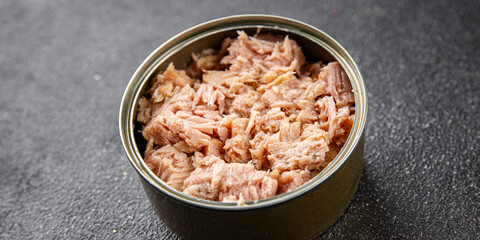 Tuna canned fish seafood appetizer dish organic product fresh tasty gourmet food background on the table rustic food top view copy space keto and paleo pescetarian diet