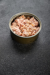Tuna canned fish seafood appetizer dish organic product fresh tasty gourmet food background on the table rustic food top view copy space keto and paleo pescetarian diet