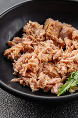 Tuna canned fish seafood appetizer dish organic product fresh tasty gourmet food background on the table rustic food top view copy space keto and paleo pescetarian diet