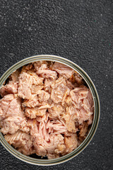 Tuna canned fish seafood appetizer dish organic product fresh tasty gourmet food background on the table rustic food top view copy space keto and paleo pescetarian diet