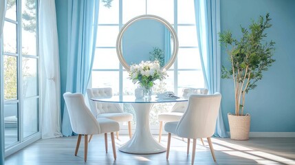 Light-filled, modern dining room with pale blue walls and white furniture