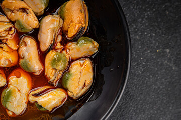 Mussels seafood canned appetizer dish organic fresh tasty gourmet food background on the table rustic food top view copy space