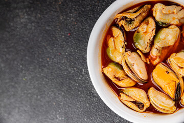 Mussels seafood canned appetizer dish organic fresh tasty gourmet food background on the table rustic food top view copy space