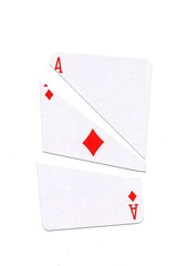 Obraz premium A playing card in the suit of diamonds cut into sharp pieces.