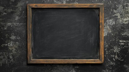 Dark grey blank chalkboard with rustic wooden frame on textured dark grey background for educational and decorative purposes in various settings