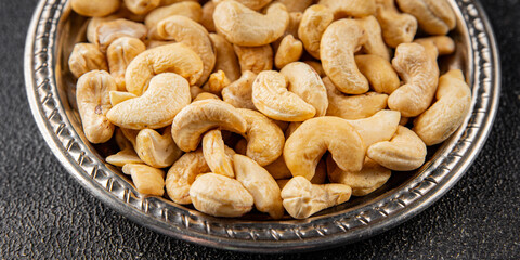 Cashew nuts superfood natural food dish organic fresh tasty gourmet food background on the table rustic food top view copy space