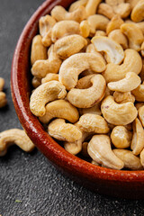 Cashew nuts superfood natural food dish organic fresh tasty gourmet food background on the table rustic food top view copy space
