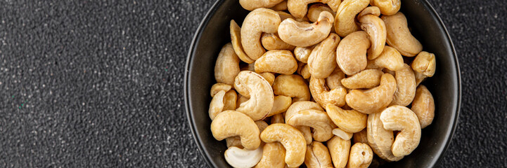 Cashew nuts superfood natural food dish organic fresh tasty gourmet food background on the table rustic food top view copy space