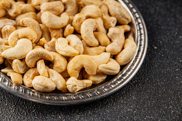Cashew nuts superfood natural food dish organic fresh tasty gourmet food background on the table rustic food top view copy space