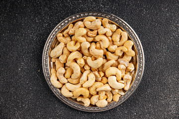 Cashew nuts superfood natural food dish organic fresh tasty gourmet food background on the table rustic food top view copy space