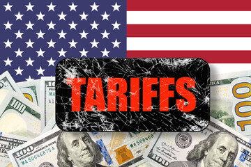 Black touch screen phone with cracked screen on USA flag and dollars background with word TARIFFS....
