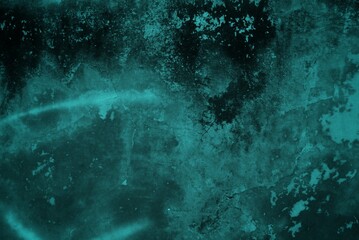 cracked wall background with light green rays, The background is a combination of dark green and black on the side there is a dark vignette