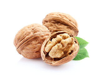 Walnuts with leaves on white background
