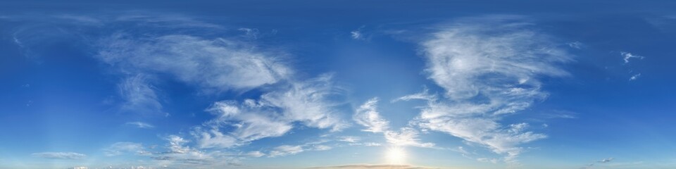 Obraz premium Seamless cloudy blue sky hdri panorama 360 degrees angle view with zenith and beautiful clouds for use in 3d graphics or game development as sky dome or edit drone shot