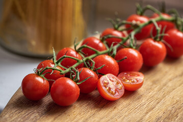 cherry tomatoes in a cutting board