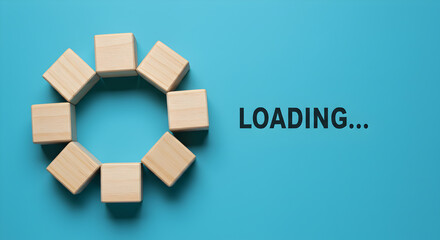 Loading Process Indicated by Wooden Blocks Arranged on a Cyan Background