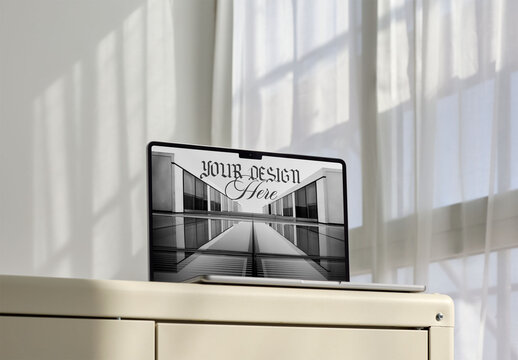 Laptop Mockup Placed on a Desk in Bright Room
