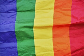 Obraz premium Rainbow Flag Pride LGBT LGBTQIA+ Symbol Colorful Fabric Texture Background Gay Love Hope Queer 