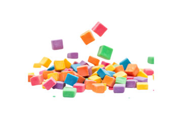 Transparent background of scattered colorful foam cubes in vibrant shades of pink, blue, yellow, and green