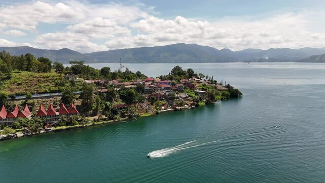 Jet ski arriving at Samosir island, Lake Toba