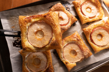 Puff pastry with apple and cream cheese. Dessert. Pastry. Bread