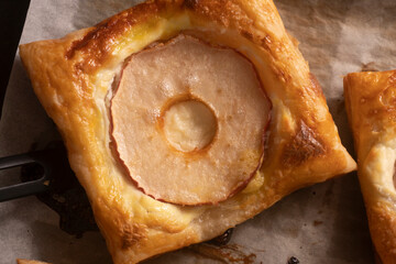 Puff pastry with apple and cream cheese. Dessert. Pastry. Bread