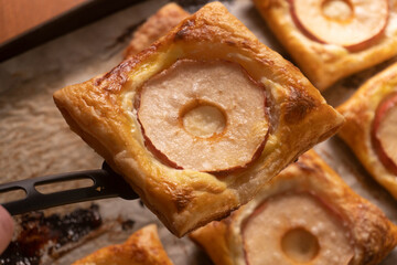 Puff pastry with apple and cream cheese. Dessert. Pastry. Bread