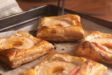 Puff pastry with apple and cream cheese. Dessert. Pastry. Bread