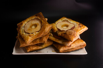 Puff pastry with apple and cream cheese. Dessert. Pastry. Bread